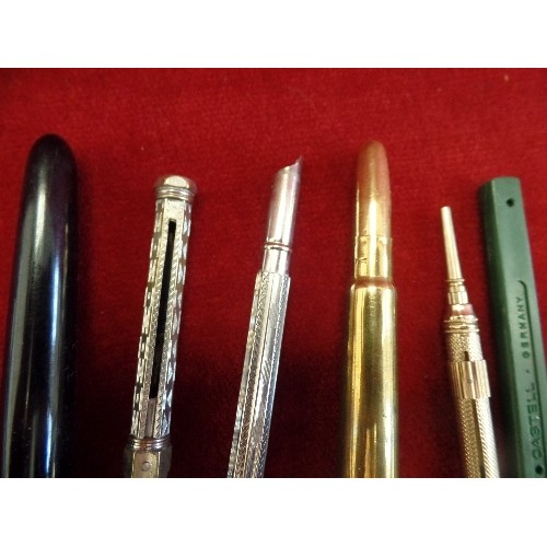 186 - VINTAGE FOUNTAIN PENS, PROPELLING PENCILS, AND A BRASS BULLET.