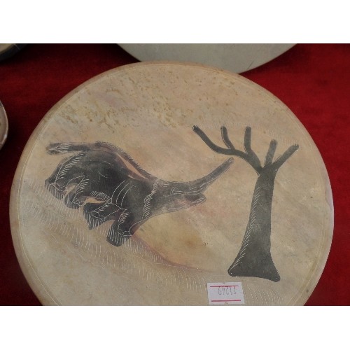 194 - AFRICAN SOAPSTONE COLLECTION. INCLUDES LIDDED DISH, 2 PLATES, AND A SOLITAIRE DISK.