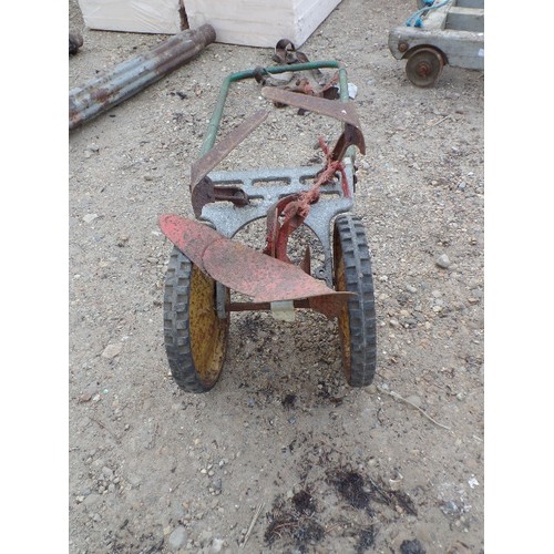 404 - HAND PLOUGH ,PUSH HOE WITH ATTACHMENTS,