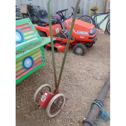 399 - VINTAGE PUSH SEED DRILL.