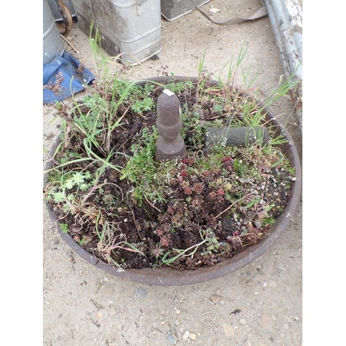 403 - CIRCULAR CAST IRON FEED TROUGH PLANTER.