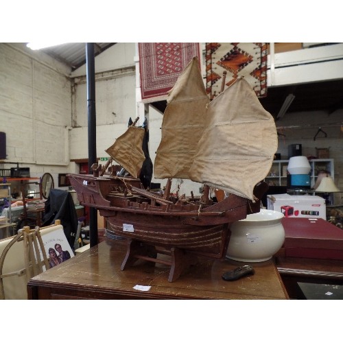 498 - WOODEN SCRATCHBUILT CHINESE JUNK SHIP. ON WOODEN STAND. 60CM L