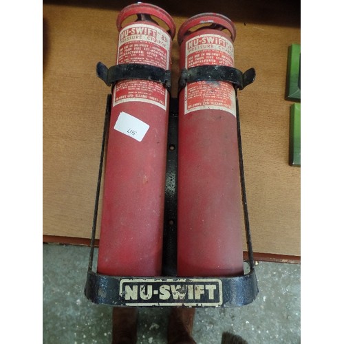 507 - VINTAGE NU-SWIFT CHARGES THAT GO INTO FIRE EXTINGUISHERS. X 2 ON METAL WALL BRACKET.