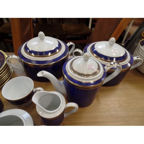 608 - GOOD QUALITY TEA AND DINNER SERVICE BY LONDON TEAPOT COMPANY. BLUE/GOLD/WHITE. FOR 8 PERSONS.