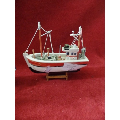 107 - 4 X SMALL WOODEN FISHING BOATS.