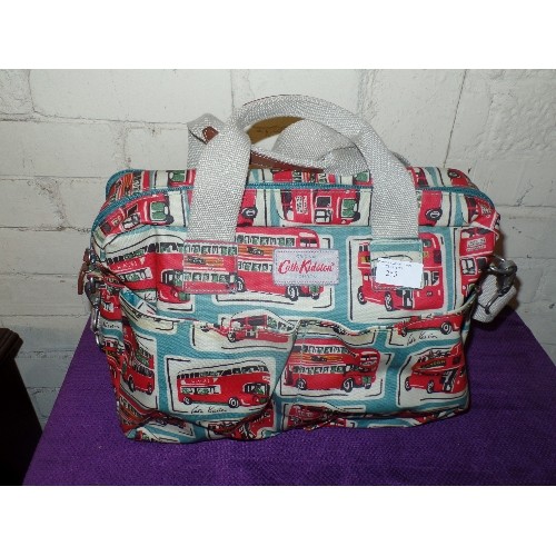 255 - LARGE CATH KIDSTON BAG. OILED FABRIC WITH LONDON BUS DESIGN. MULTIPLE POCKETS.