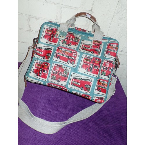 255 - LARGE CATH KIDSTON BAG. OILED FABRIC WITH LONDON BUS DESIGN. MULTIPLE POCKETS.