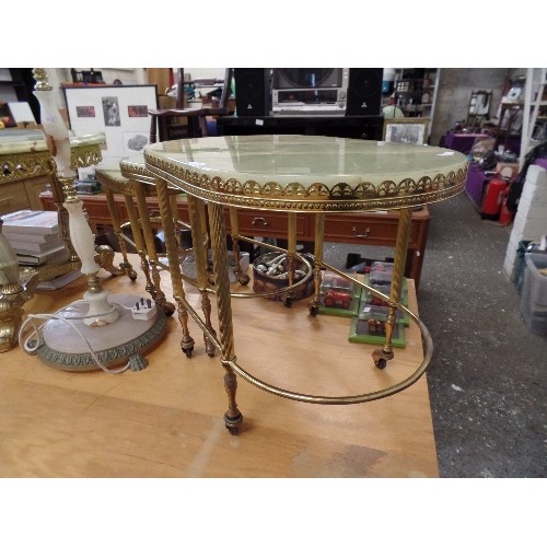 544 - RETRO ONYX AND GOLD GILT NEST OF 3 TABLES. ON CASTORS.