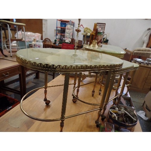 544 - RETRO ONYX AND GOLD GILT NEST OF 3 TABLES. ON CASTORS.