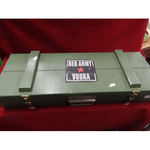 110 - RED ARMY VODKA GAME. IN LARGE ARMY-STYLE WOODEN BOX. CONTAINS LARGE REVOLVER SHAPED DECANTER, SHOT G... 