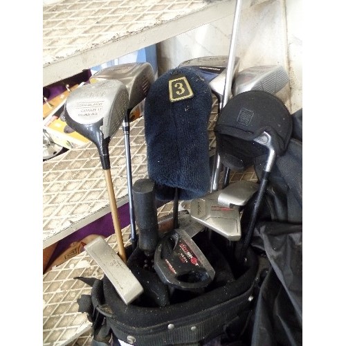 220 - MEMPHIS GOLF BAG, FULL OF CLUBS, WOODS, AND PUTTERS ETC. WITH RAIN COVER.