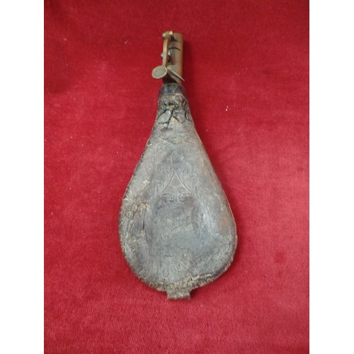 570 - ANTIQUE LEATHER AND BRASS GUNPOWDER FLASK, A WOOD AND METAL GUNPOWDER HORN.