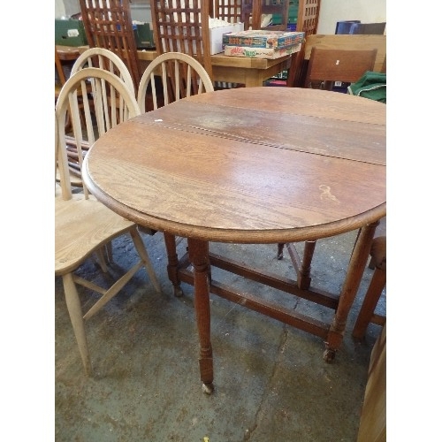 607 - VINTAGE OAK DROP-LEAF TABLE.