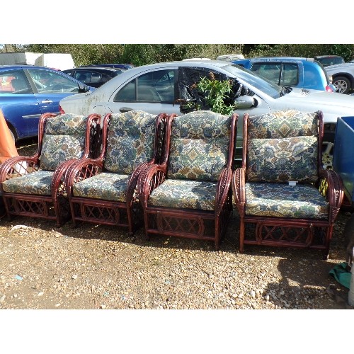 415 - 4 X LARGE DARK CANE GARDEN ARMCHAIRS. DEEP UPHOLSTERED SQUARE CUSHION PADS IN ATTRACTIVE PATTERNED F... 