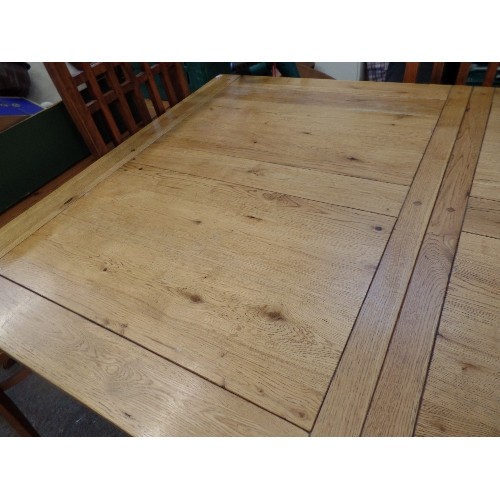 688 - VERY HEAVY OAK EXTENDING RECTANGULAR DINING TABLE.