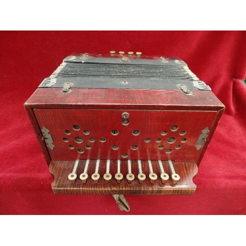 77 - AN EARLY 20TH CENTURY ACCORDION WITH METAL LABEL 