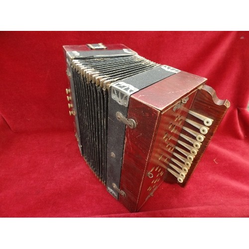 77 - AN EARLY 20TH CENTURY ACCORDION WITH METAL LABEL 