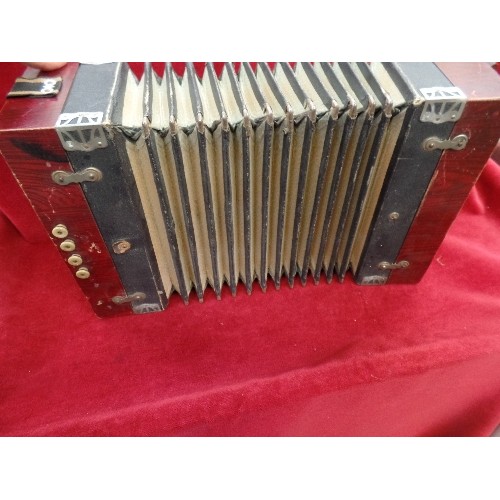77 - AN EARLY 20TH CENTURY ACCORDION WITH METAL LABEL 
