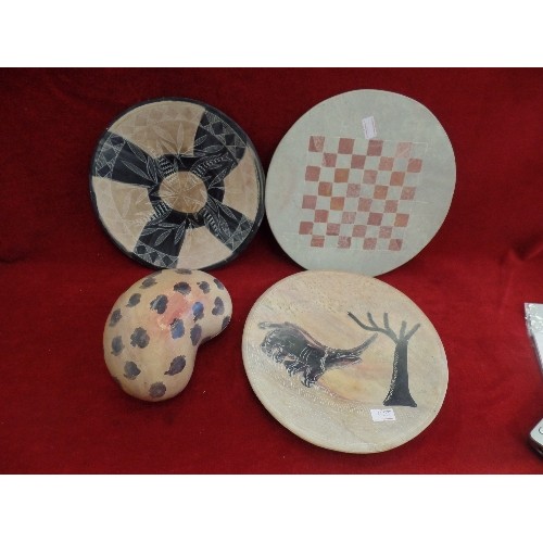 142 - AFRICAN SOAPSTONE COLLECTION. INCLUDES LIDDED DISH, 2 PLATES, AND A SOLITAIRE DISK.
