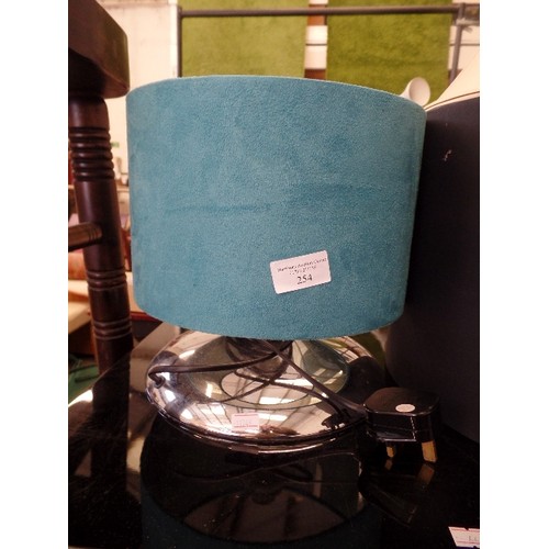 234 - TABLE LAMP WITH TURQUOISE FAUX SUEDE SHADE, PLUS 3 OTHER LAMPSHADES.