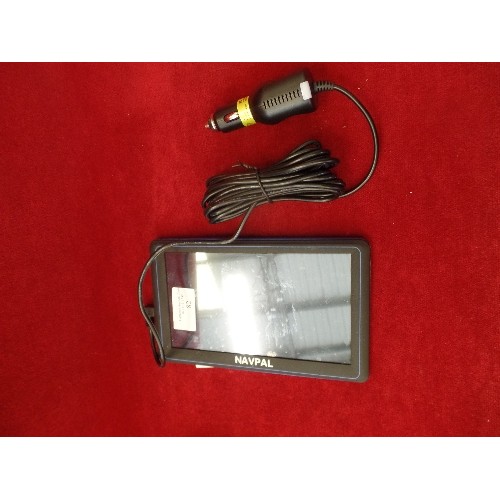 82 - NAVPAL GPS SATNAV. WITH CAR CHARGER AND USER GUIDE.