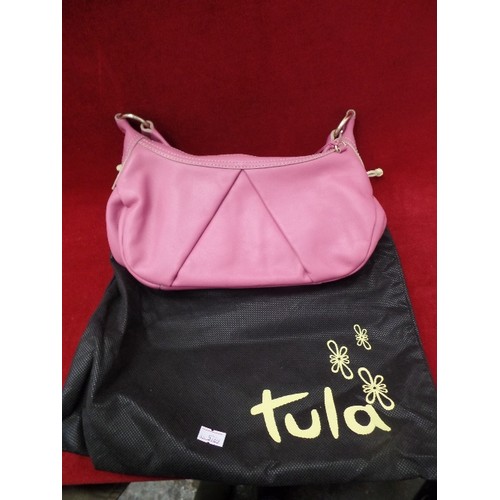 101 - TULA LEATHER BAG IN DARK PINK. WITH DUST BAG.