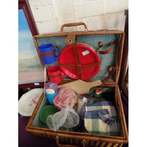 193 - WICKER PICNIC BASKET. GINGHAM-LINED. WITH CONTENTS.