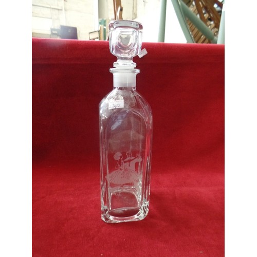 184 - HEAVY CONTEMPORARY GLASS DECANTER. FEATURING BALLROOM DANCERS. WITH STOPPER.