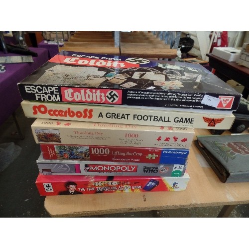 244 - STACK OF LARGE BOARD GAMES AND PUZZLES. INC 'ESCAPE FROM COLDITZ' 'SOCCERBOSS' MONOPOLY, AND DOCTOR ... 