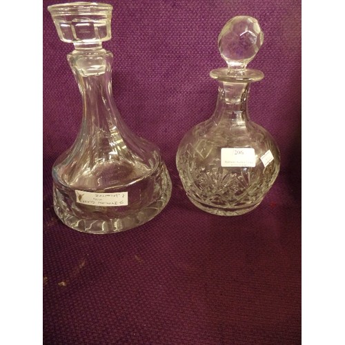 206 - A CONTEMPORARY WIDE-BASED ITALIAN CUT-GLASS DECANTER, AND A SMALLER DECANTER. BOTH WITH STOPPERS.