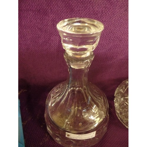 206 - A CONTEMPORARY WIDE-BASED ITALIAN CUT-GLASS DECANTER, AND A SMALLER DECANTER. BOTH WITH STOPPERS.