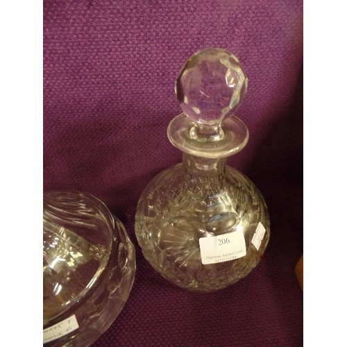 206 - A CONTEMPORARY WIDE-BASED ITALIAN CUT-GLASS DECANTER, AND A SMALLER DECANTER. BOTH WITH STOPPERS.