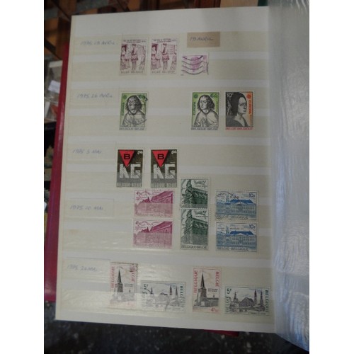 252 - 4 X LARGE STAMP STOCK BOOKS. CONTAINING LARGE QUANTITY OF STAMPS.