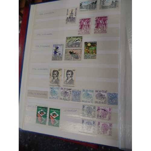 252 - 4 X LARGE STAMP STOCK BOOKS. CONTAINING LARGE QUANTITY OF STAMPS.