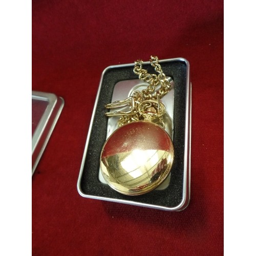 20 - A RAVEL POCKET WATCH WITH FOB CHAIN BOXED WORKING
