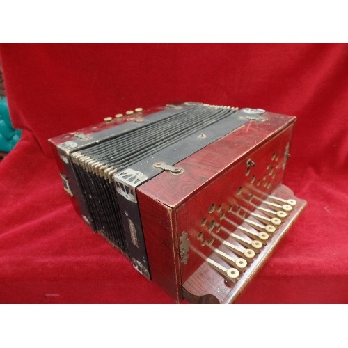 66 - AN EARLY 20TH CENTURY ACCORDION WITH METAL LABEL 