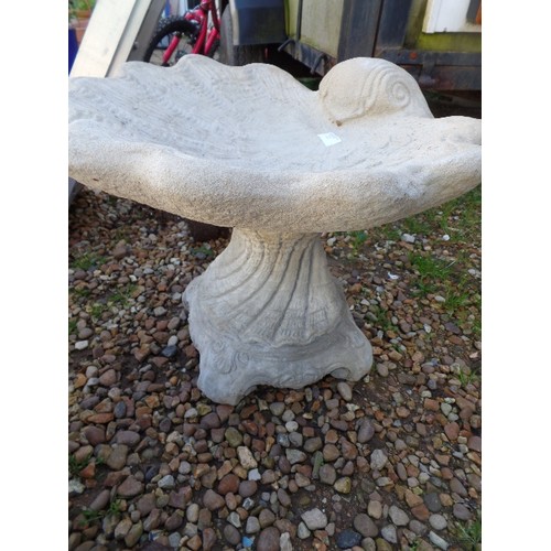 423 - SHELL BIRD BATH. ON DECORATIVE BASE.