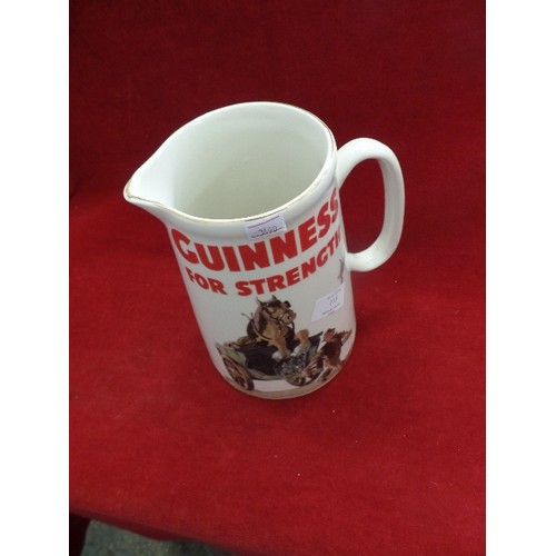 115 - LARGE 'GUINNESS FOR STRENGTH' BAR JUG. WITH FARMER PULLING HIS SHIRE HORSE IN THE CART!