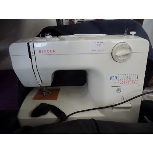 140 - ELECTRIC SINGER SEWING MACHINE. MODEL 1116. ZIG-ZAG FACILITY ETC. WITH CARRY BAG.