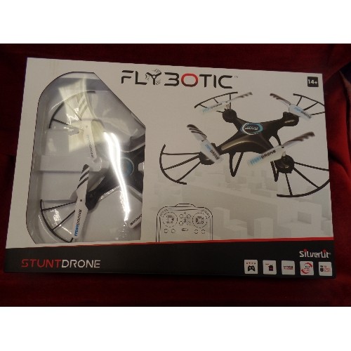 243 - FLYBOTIC STUNT DRONE. APPEARS NEW/BOXED