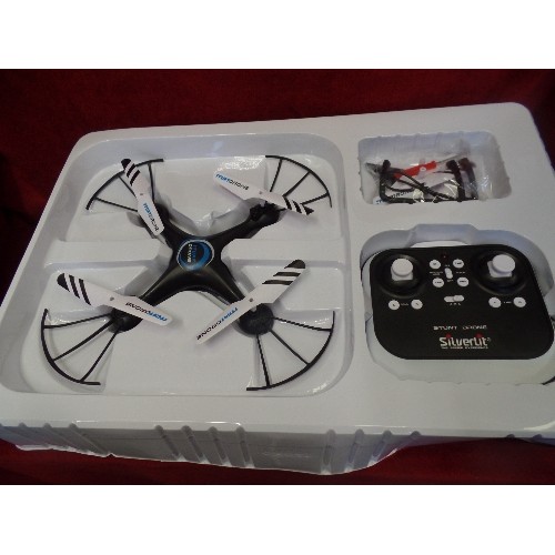 243 - FLYBOTIC STUNT DRONE. APPEARS NEW/BOXED