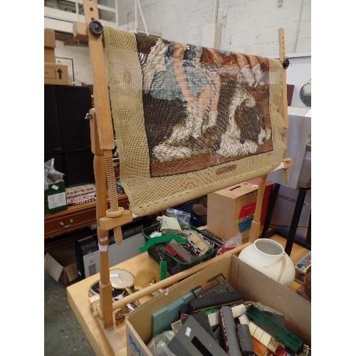 295 - WOODEN TAPESTRY WORKING FRAME. ADJUSTABLE. TOGETHER WITH A CANVAS OF RENOIR IMAGE OF 2 GIRL (STARTED... 