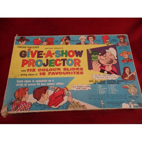 297 - VINTAGE CHAD VALLEY 'GIVE-A-SHOW' PROJECTOR. WITH SLIDES. IN ORIGINAL BOX.