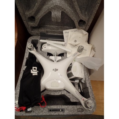 385 - PHANTOM 4 DRONE V1.2/ FLYING CAMERA. APPEARS ALMOST NEW CONDITION. WITH CHARGERS, INSTRUCTIONS, CARR... 