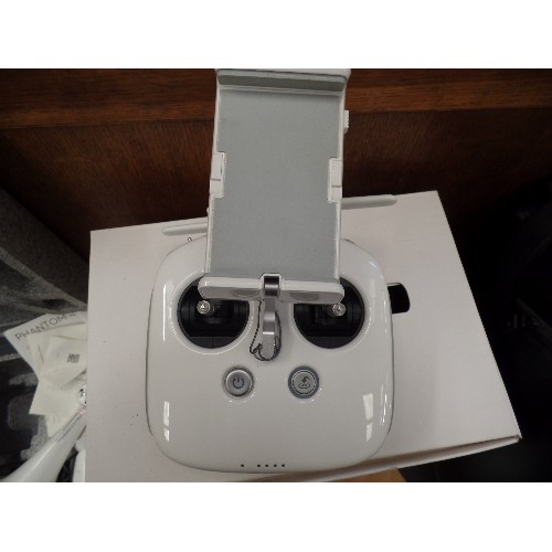 385 - PHANTOM 4 DRONE V1.2/ FLYING CAMERA. APPEARS ALMOST NEW CONDITION. WITH CHARGERS, INSTRUCTIONS, CARR... 