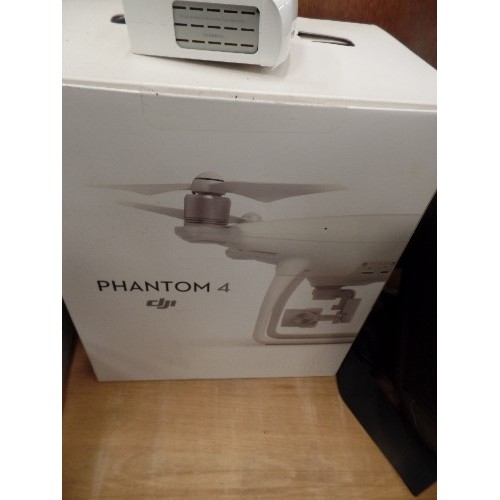 385 - PHANTOM 4 DRONE V1.2/ FLYING CAMERA. APPEARS ALMOST NEW CONDITION. WITH CHARGERS, INSTRUCTIONS, CARR... 