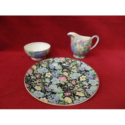 4 - A VINTAGE ROYAL WINTON CHINTZ PATTERN CREAM JUG AND BOWL AND AN EMPIRE WARE CHINTZ PLATE