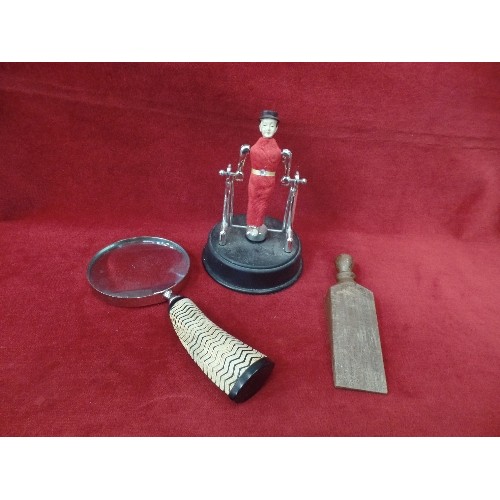 6 - AN ACROBATIC TOY - WORKS BY MAGNET & BATTERY, A WOODEN DOORSTOP AND A MAGNIFYING GLASS WITH ZIGZAG S... 