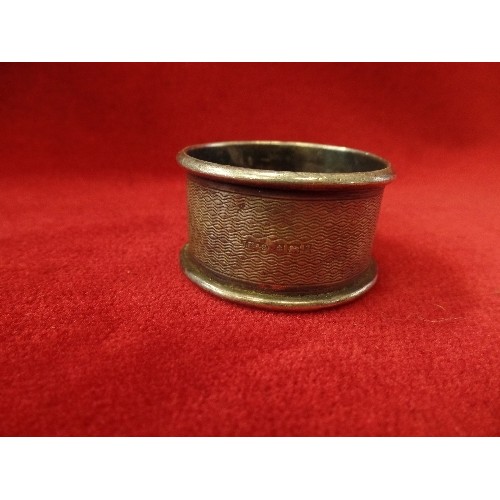 23 - AN ANTIQUE  STERLING SILVER NAPKIN RING WITH BIRMINGHAM HALLMARK