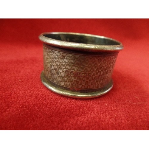 23 - AN ANTIQUE  STERLING SILVER NAPKIN RING WITH BIRMINGHAM HALLMARK